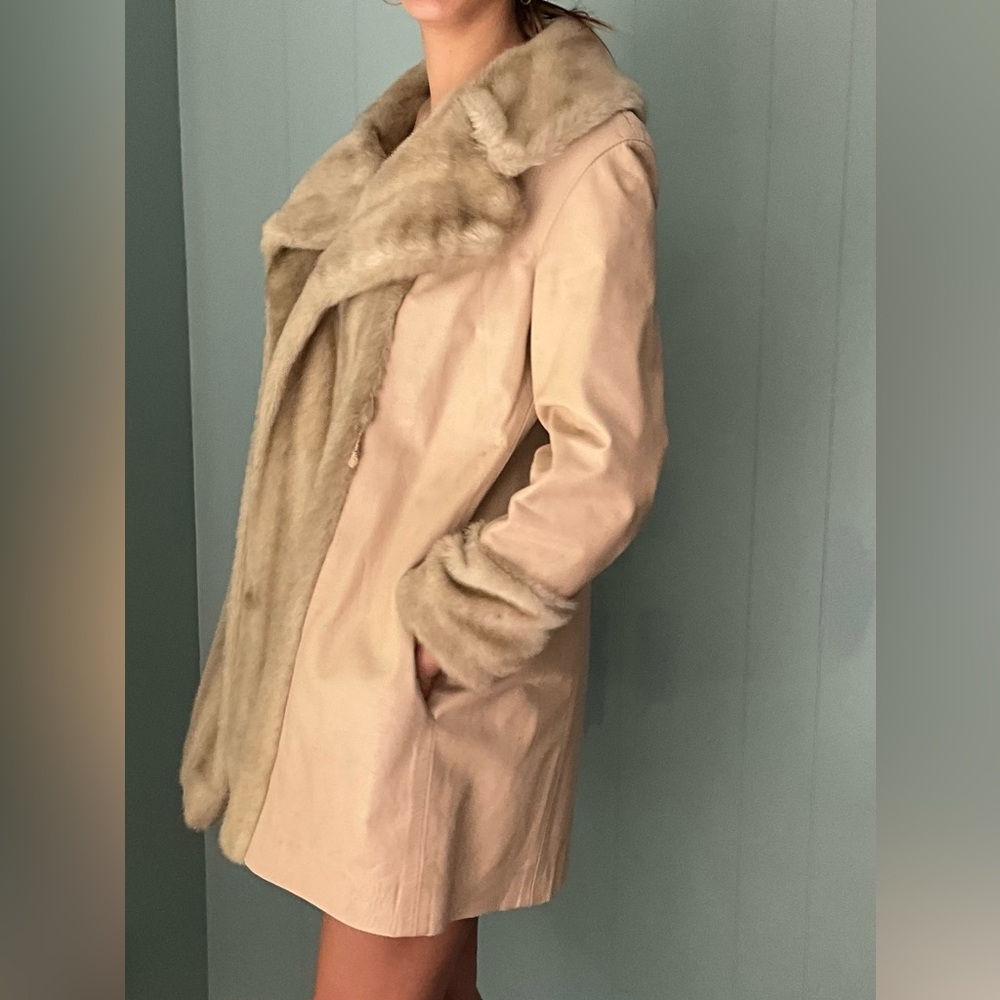 Vintage cream London swings with a gorgeous leather wrap coat.Made in England.